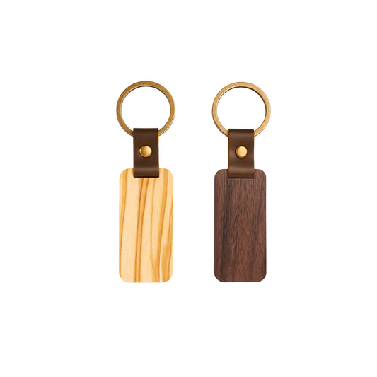 Wooden tag keychain in walnut and olive with leather strap, personalized with engraving